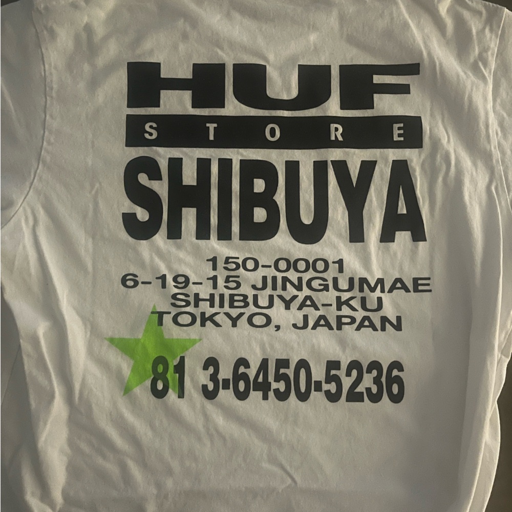 HUF White Tee with Black Text and Green Star